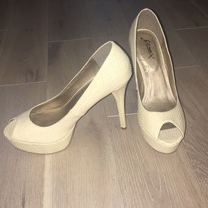 Ivory peep toe pumps